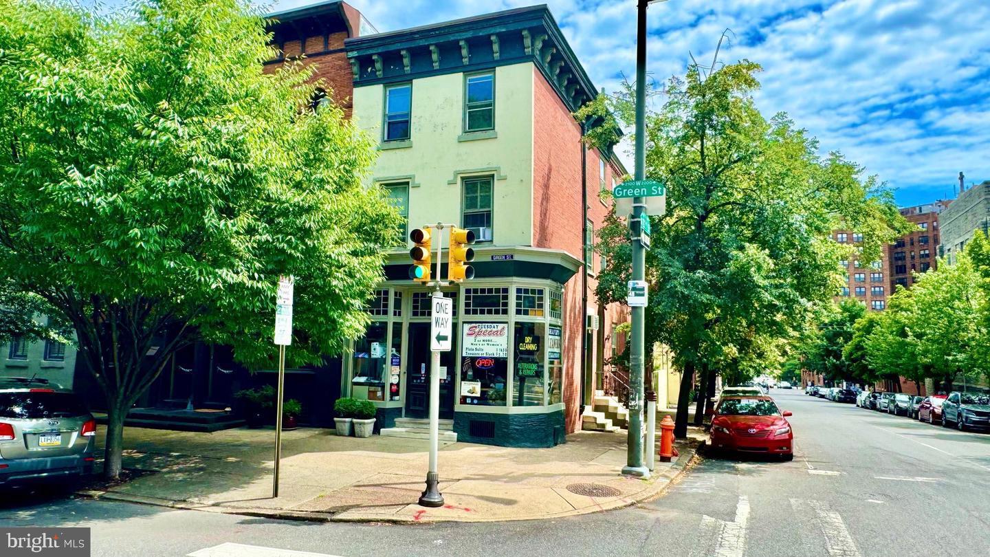 2148 Green Street, Unit 2 Philadelphia, PA 19130 - Photo 26 of 27 a front view of a house with garden