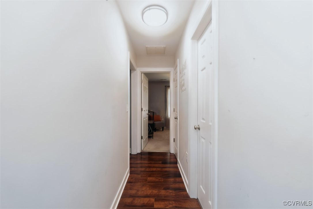 228 Pine Ridge Road Aylett, VA 23009 - Photo 17 of 25 Hallway featuring dark hardwood / wood-style floor