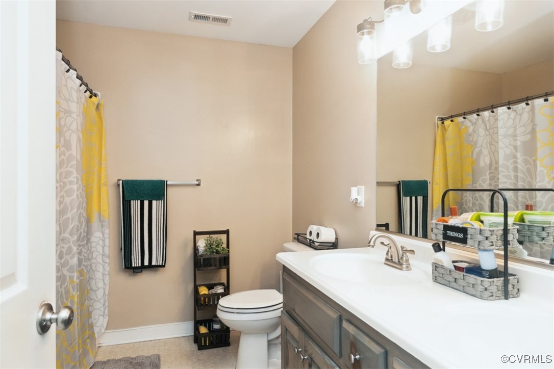 228 Pine Ridge Road Aylett, VA 23009 - Photo 21 of 25 Bathroom featuring tile patterned flooring, toilet