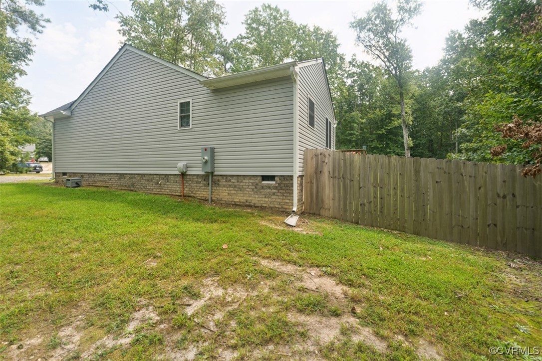 228 Pine Ridge Road Aylett, VA 23009 - Photo 23 of 25 View of side of property featuring a yard