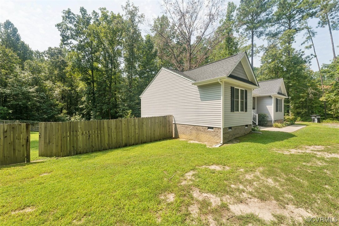 228 Pine Ridge Road Aylett, VA 23009 - Photo 3 of 25 View of home's exterior featuring a lawn