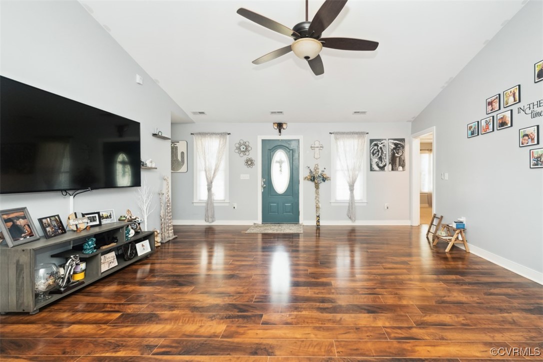 228 Pine Ridge Road Aylett, VA 23009 - Photo 7 of 25 Living room with ceiling fan, vaulted ceiling, and