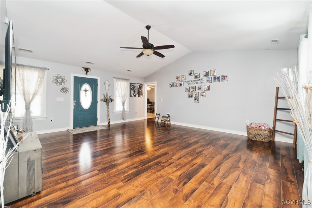 228 Pine Ridge Road Aylett, VA 23009 - Photo 8 of 25 Unfurnished living room with ceiling fan, dark har