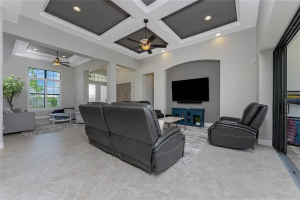 a bathroom with a granite countertop sink mirror and toilet