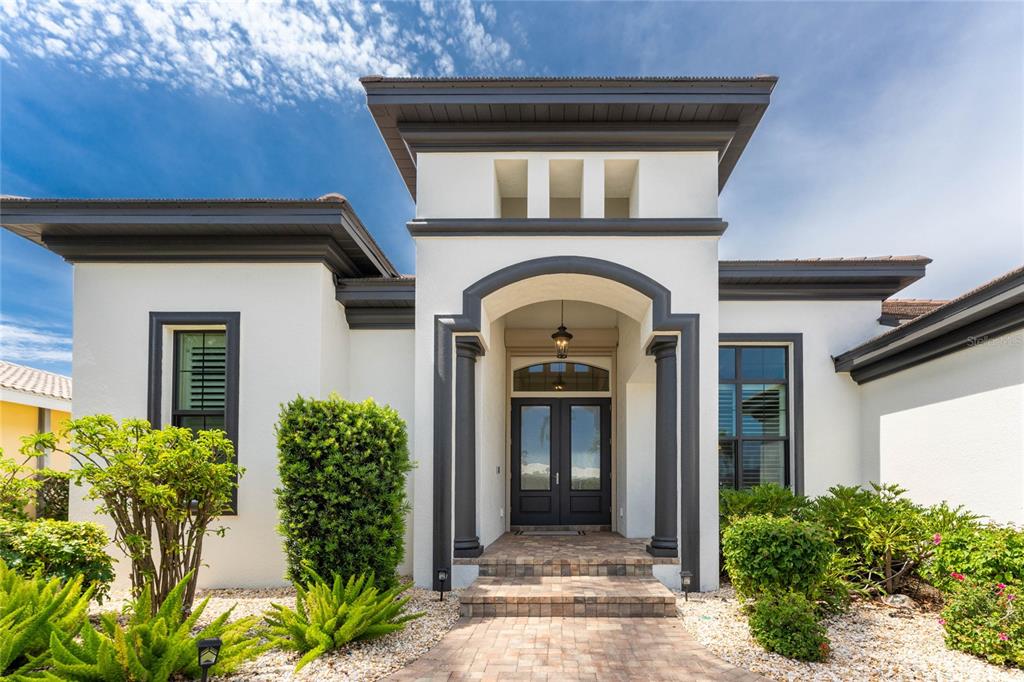 2730 Rio Court Punta Gorda, FL 33950 - Photo 2 of 71 a front view of a house with garden