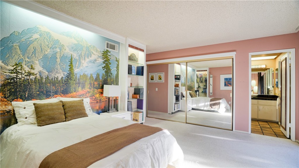 2117 Capuchin Way Claremont, CA 91711 - Photo 20 of 36 a bedroom with furniture and large windows