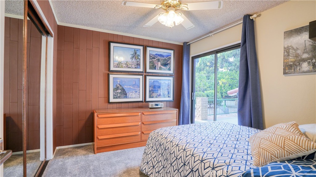 2117 Capuchin Way Claremont, CA 91711 - Photo 25 of 36 a bedroom with a bed and a window