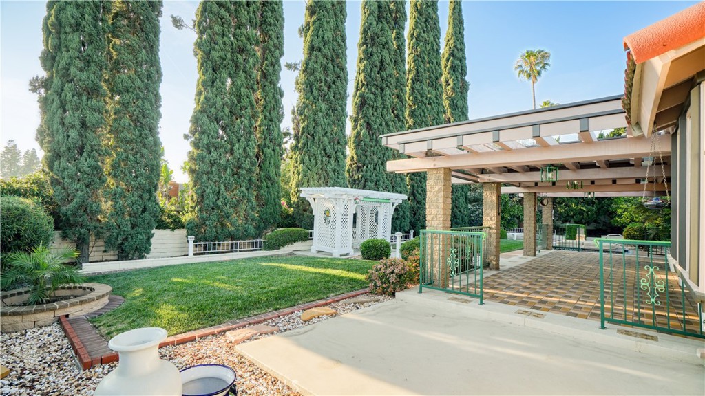 2117 Capuchin Way Claremont, CA 91711 - Photo 29 of 36 a view of a patio with a chairs and table in a patio
