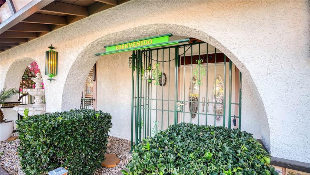 2117 Capuchin Way Claremont, CA 91711 - Photo 5 of 36 a view of a small house with potted plants