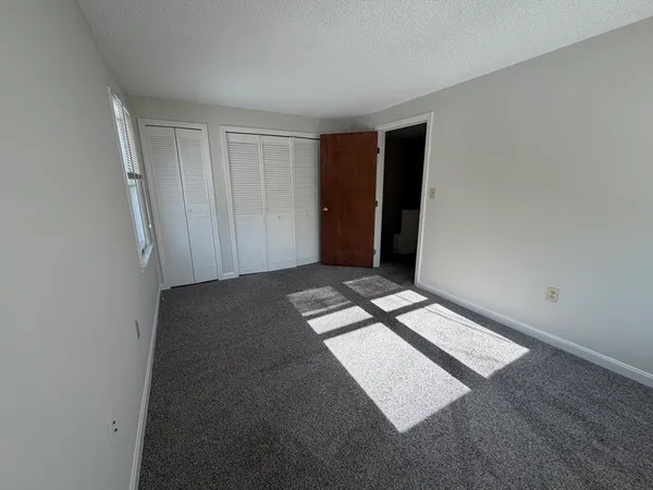 an empty room with a chair