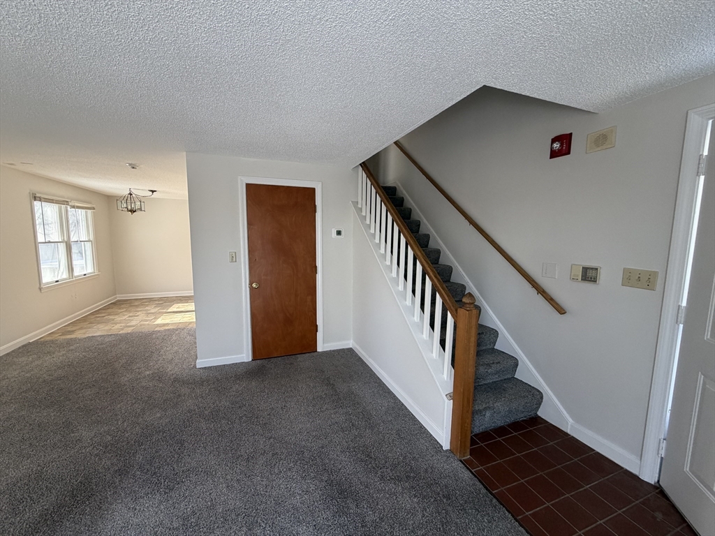 213 Victoria Heights Road, Unit 213 Boston, MA 02136 - Photo 2 of 18 a view of an entryway with stairs