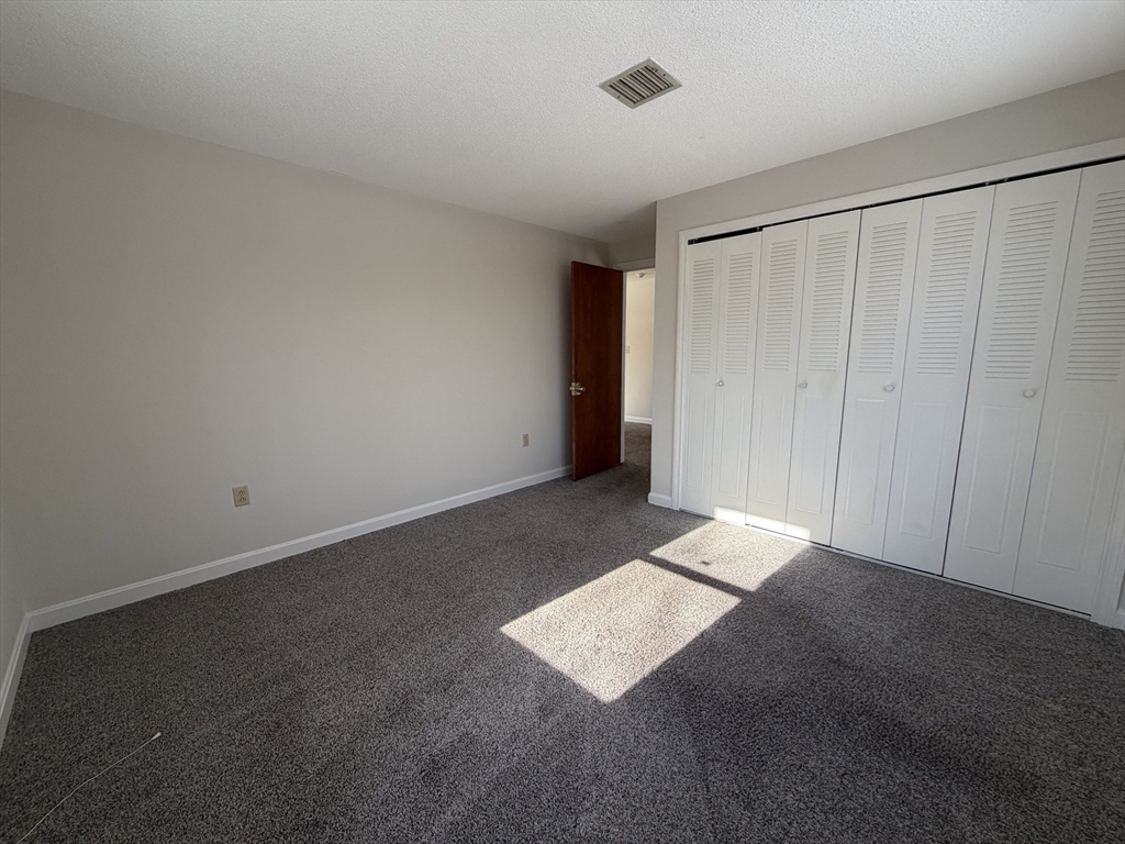 213 Victoria Heights Road, Unit 213 Boston, MA 02136 - Photo 7 of 18 a view of an empty room