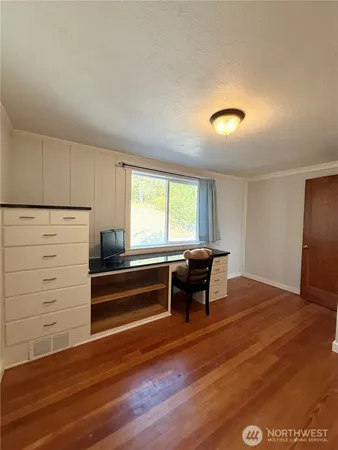 a bathroom with a toilet a sink and bathtub