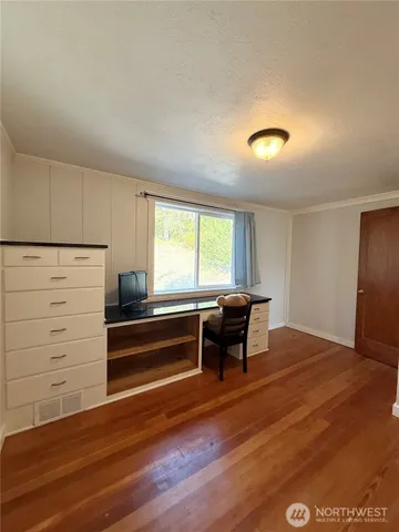 a bathroom with a toilet a sink and bathtub