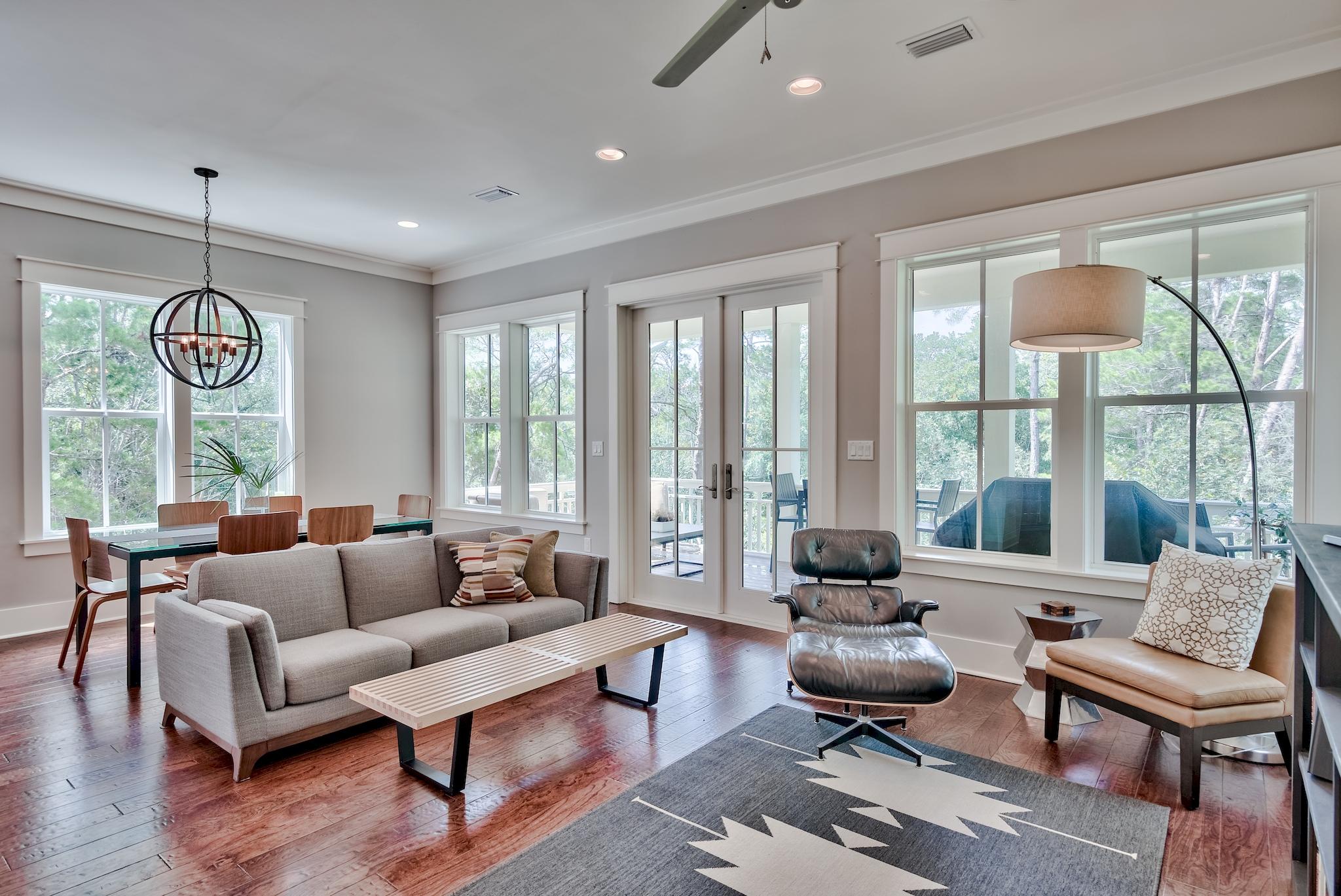 97 Okeechobee West Santa Rosa Beach, FL 32459 - Photo 13 of 46 a living room with furniture floor to ceiling window and wooden floor