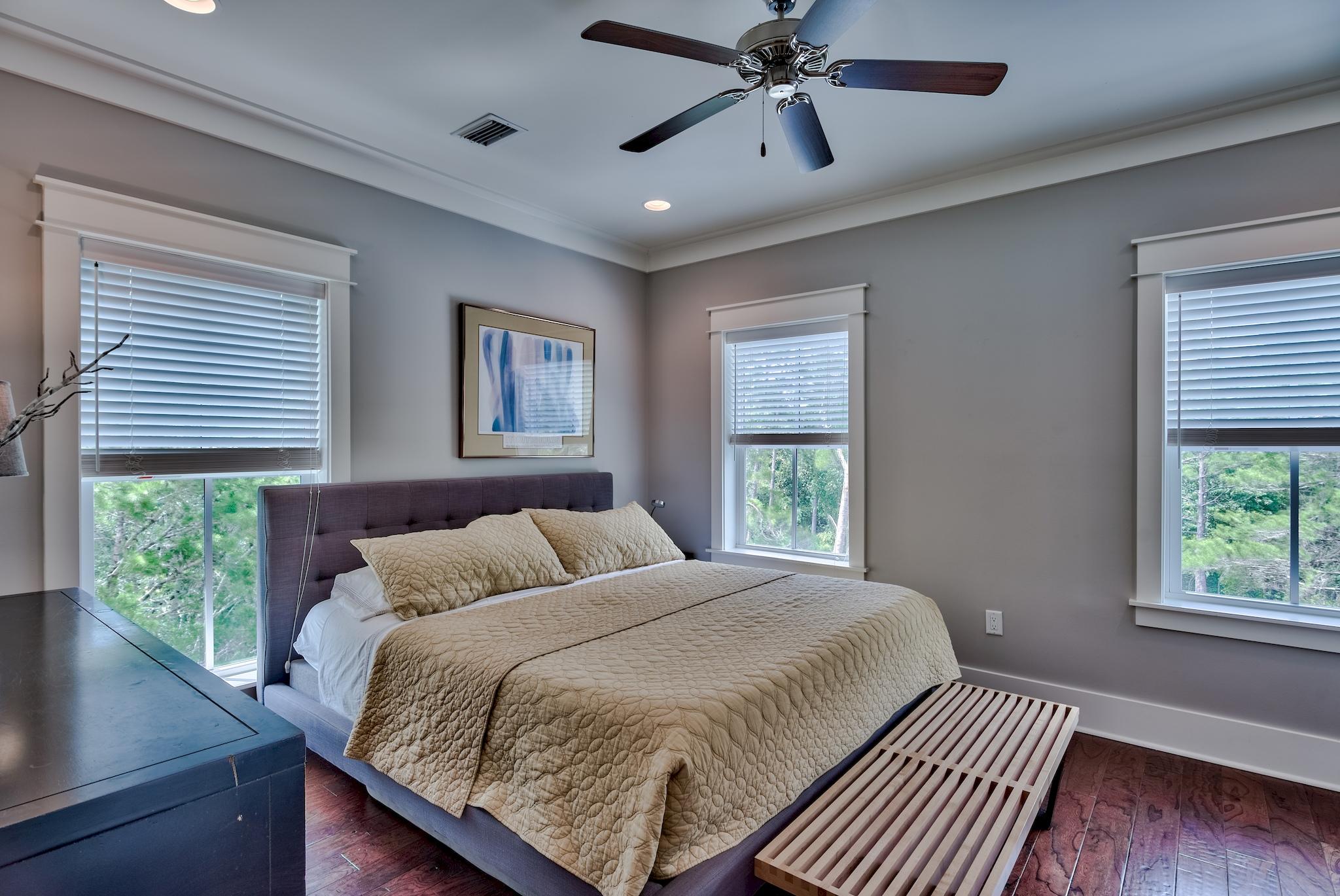 97 Okeechobee West Santa Rosa Beach, FL 32459 - Photo 21 of 46 a bedroom with a large bed and a window