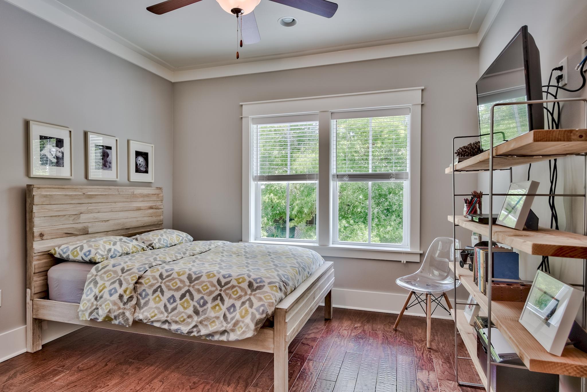 97 Okeechobee West Santa Rosa Beach, FL 32459 - Photo 25 of 46 a bedroom with a bed and a table in it