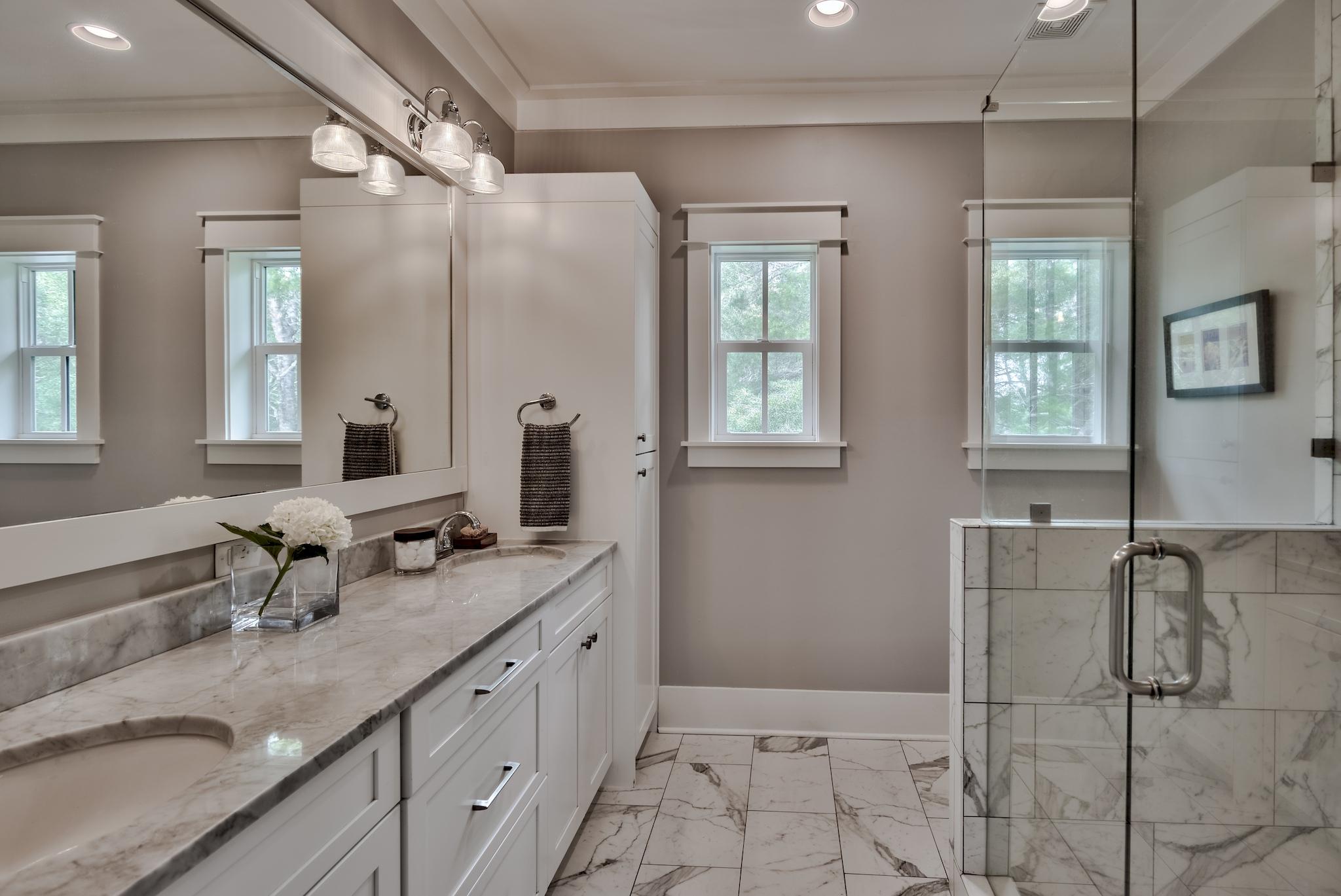 97 Okeechobee West Santa Rosa Beach, FL 32459 - Photo 29 of 46 a bathroom with double vanity and a mirror