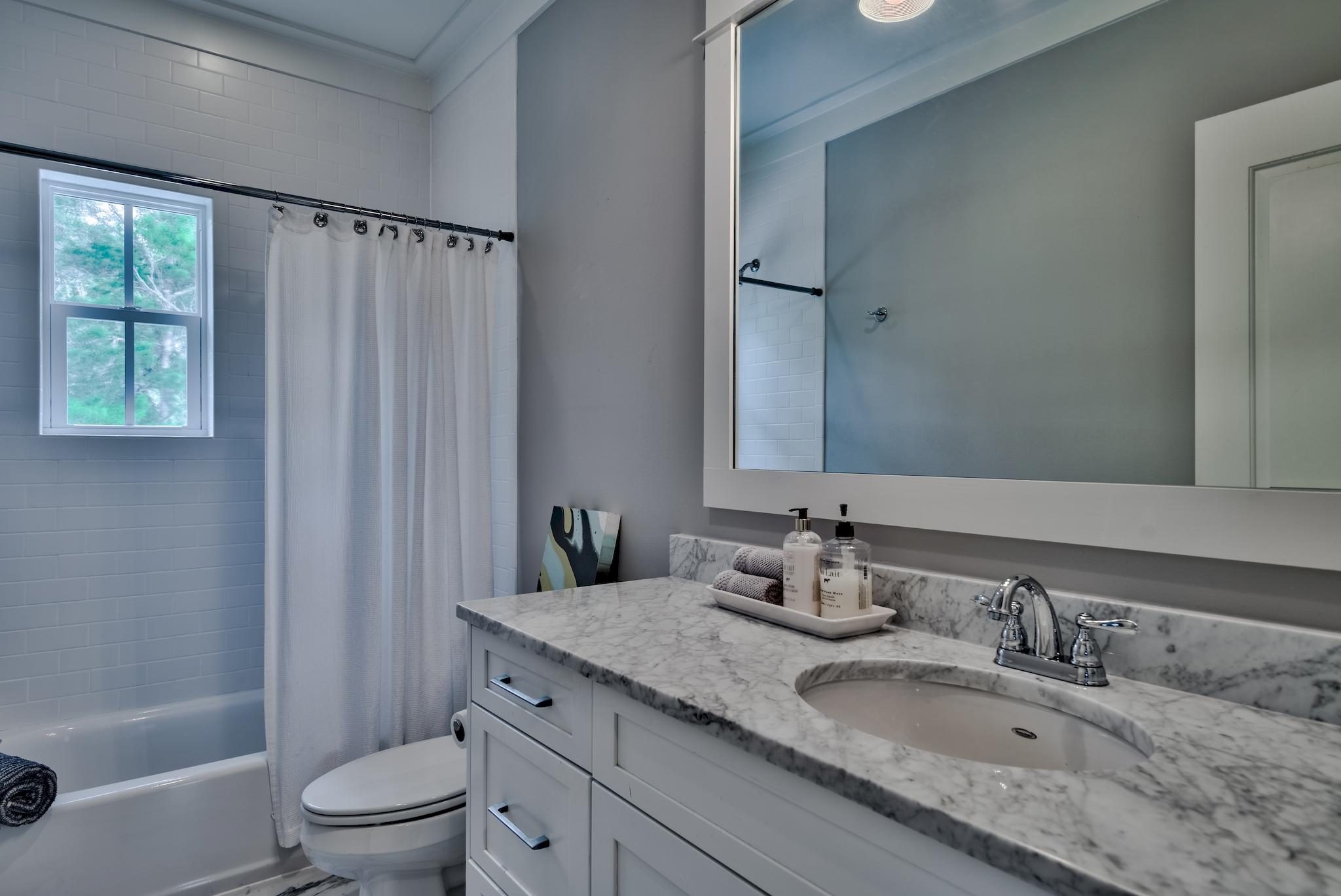97 Okeechobee West Santa Rosa Beach, FL 32459 - Photo 32 of 46 a bathroom with a granite countertop sink toilet and shower