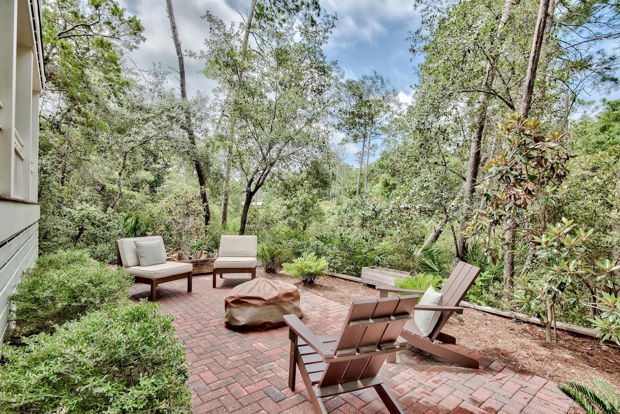 97 Okeechobee West Santa Rosa Beach, FL 32459 - Photo 6 of 46 a backyard of a house with outdoor seating
