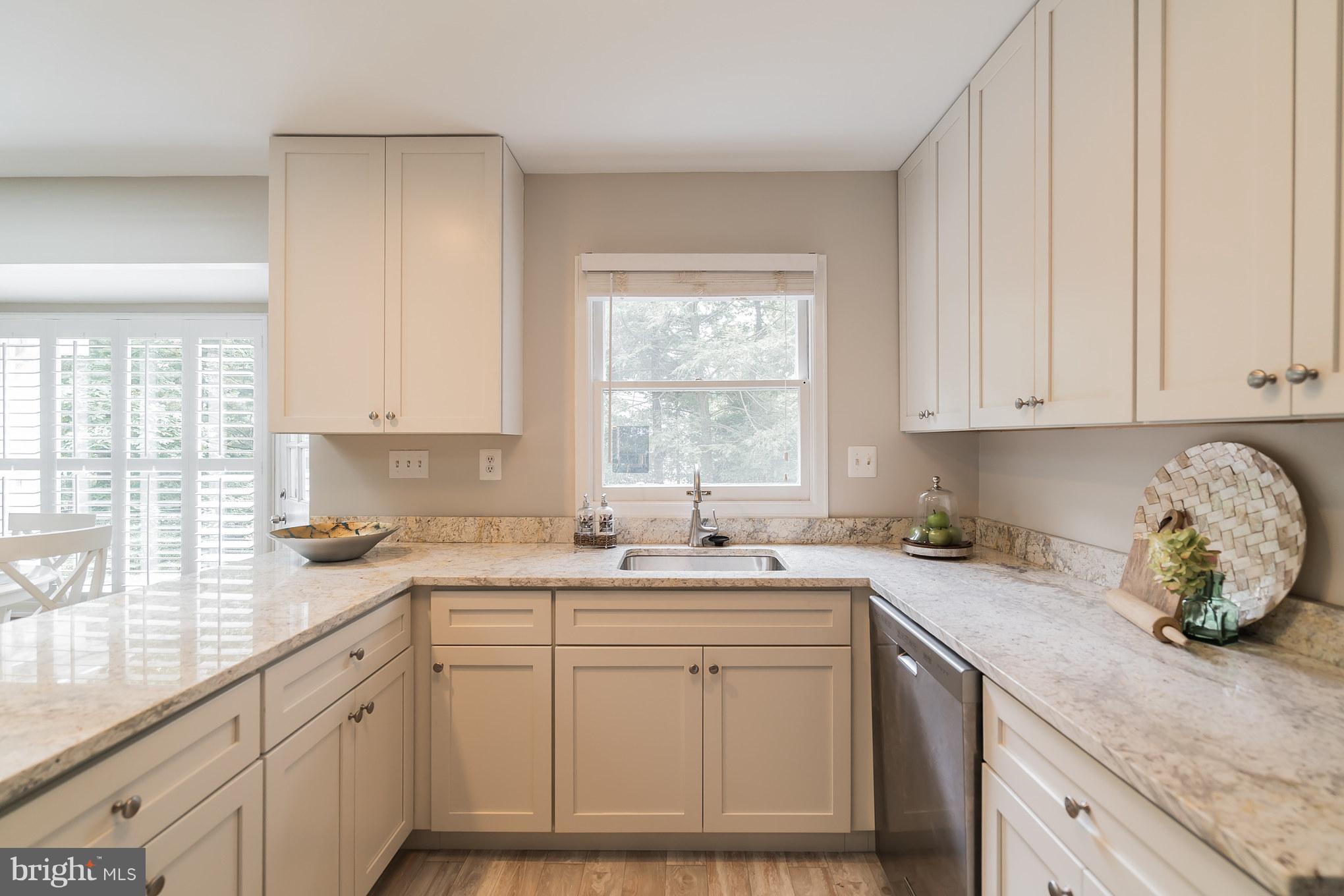 9541 Warfield Road Gaithersburg, MD 20882 - Photo 7 of 29 Floors, cabinets and counter tops all new!