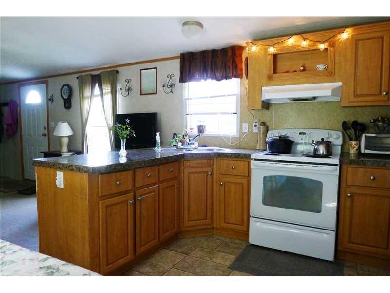 41 Federal Road Livermore, ME 04253 - Photo 3 of 34 Open kitchen-dining-living area.