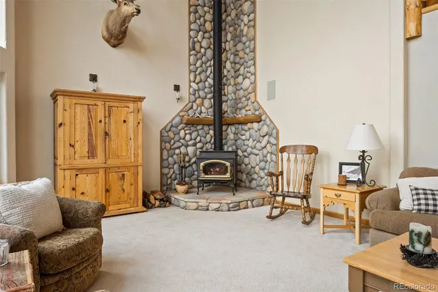 a view of a dining room with furniture and window
