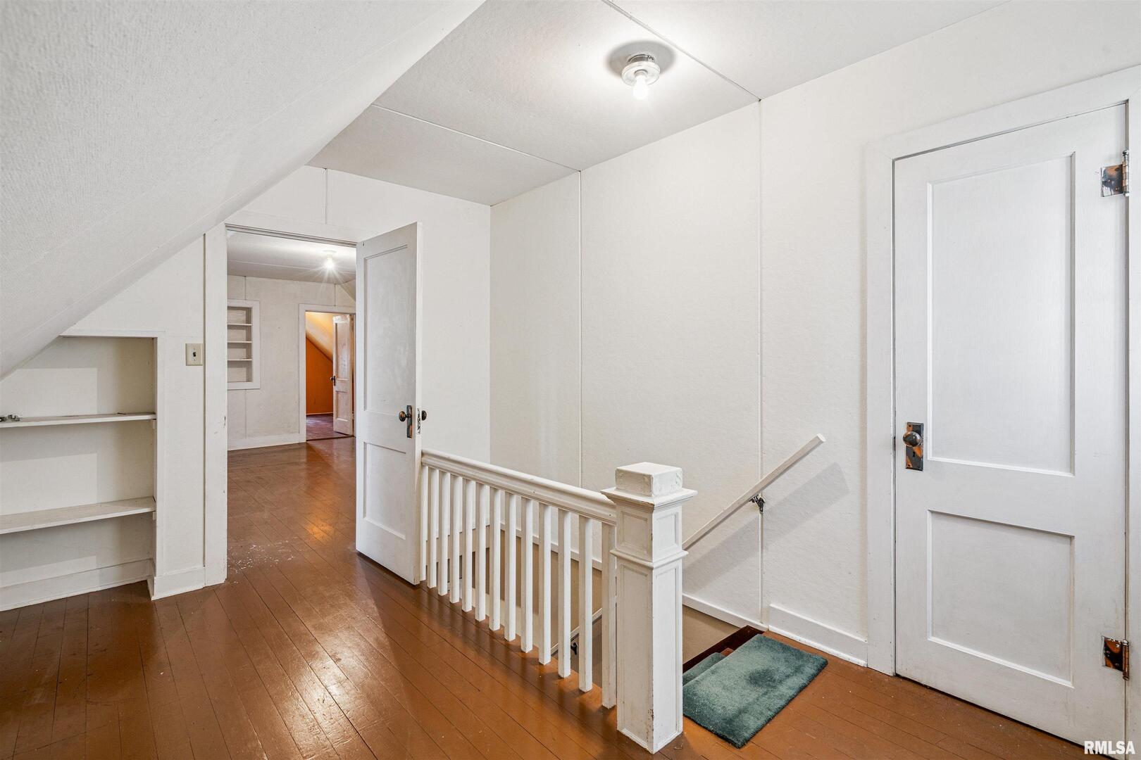314 West 3rd Street Prophetstown, IL 61277 - Photo 22 of 29 a view of a hallway with wooden floor and entryway