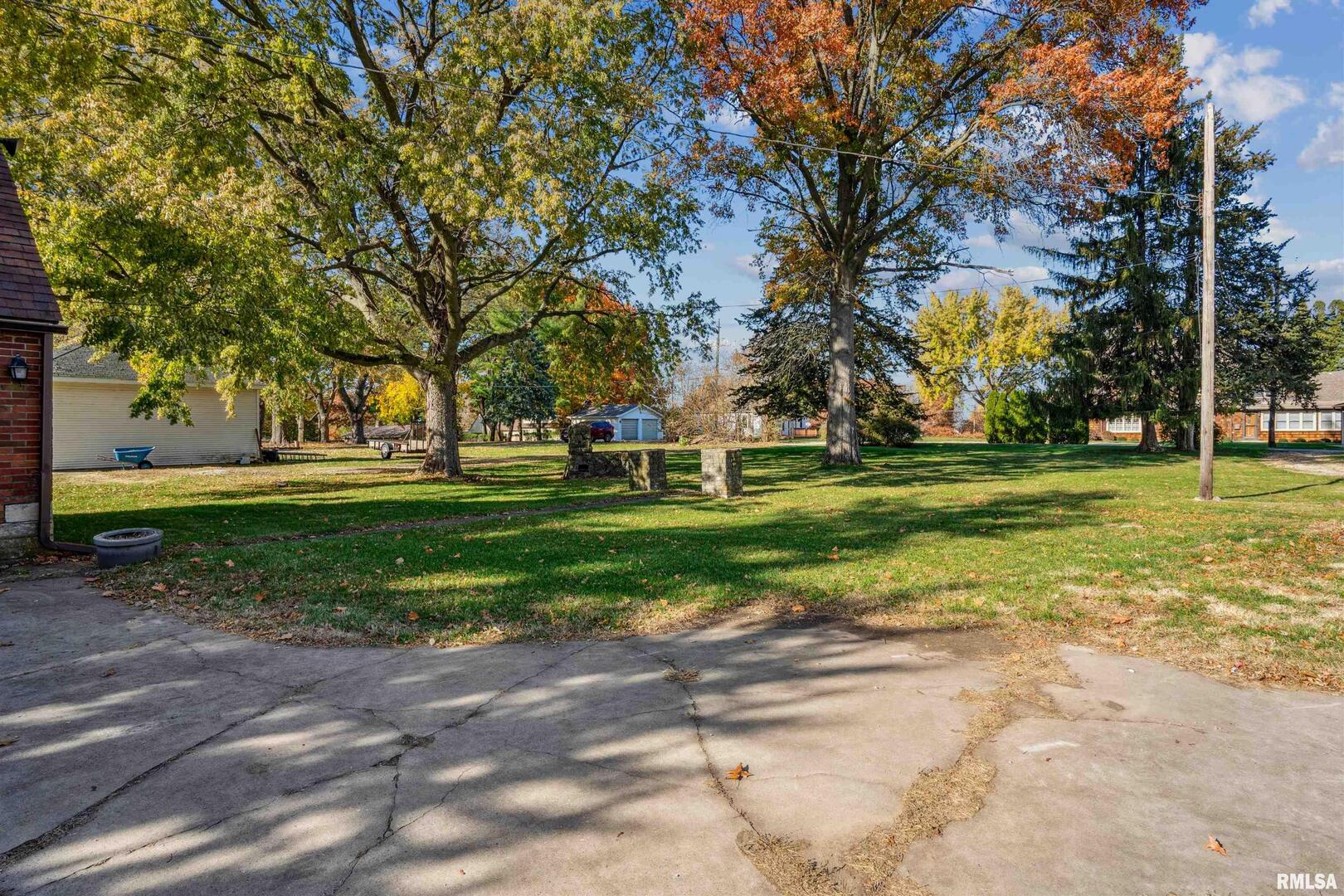 314 West 3rd Street Prophetstown, IL 61277 - Photo 24 of 29 a view of a park with large trees