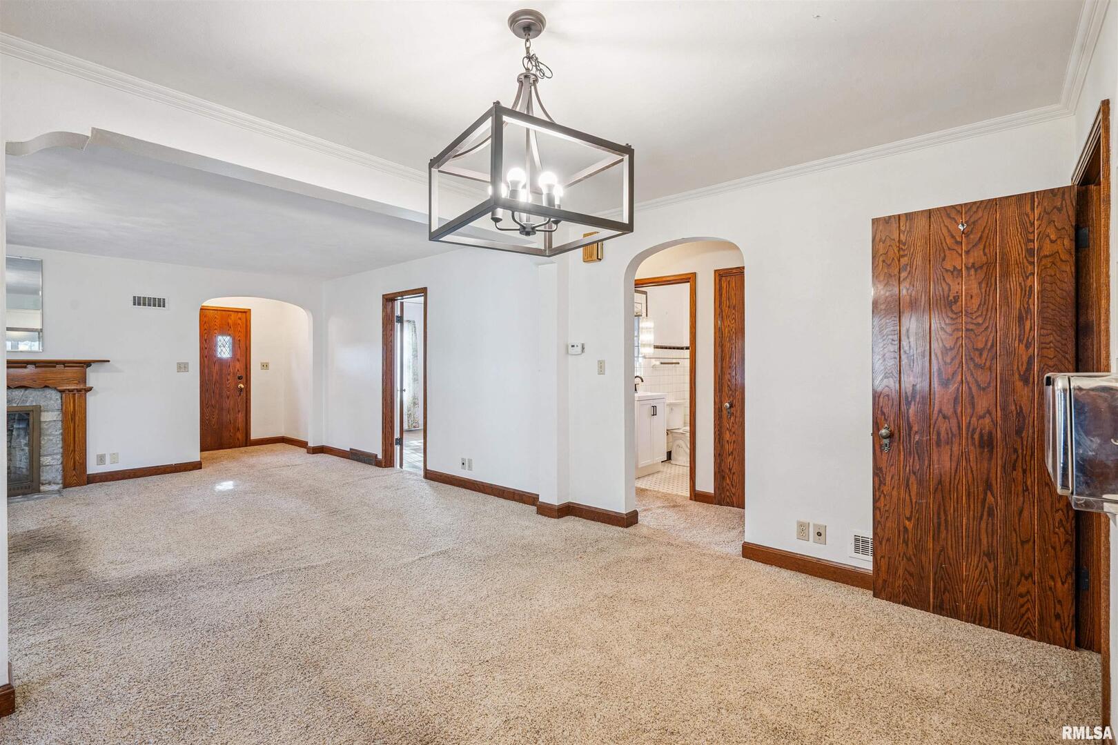 314 West 3rd Street Prophetstown, IL 61277 - Photo 9 of 29 a view of empty room with chandelier