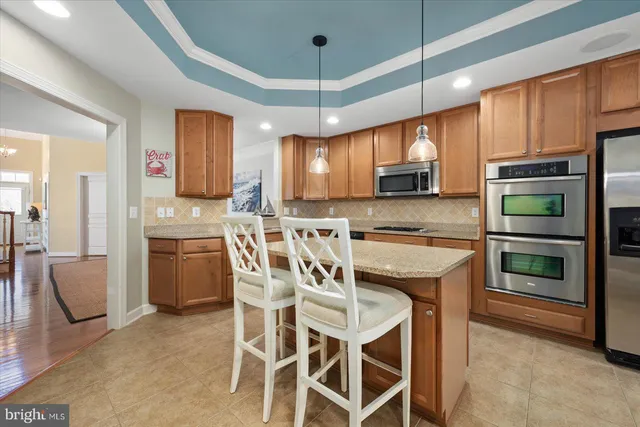 a view of a livingroom with furniture and a fireplace