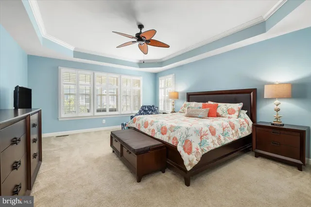 a bathroom with a tub a sink shower and mirror