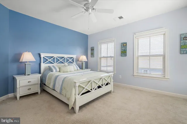 a bedroom with a bed and a closet