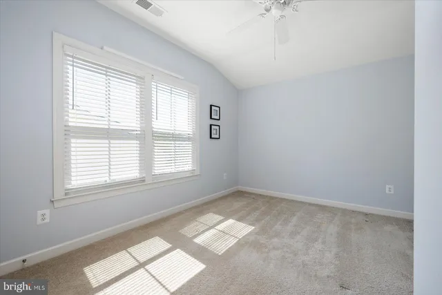 a bed room with a bed and a couch