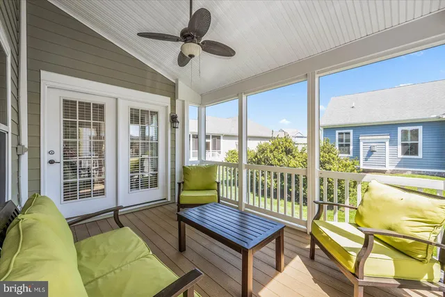a view of a living room and kitchen