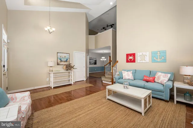 a view of a room with window and wooden floor
