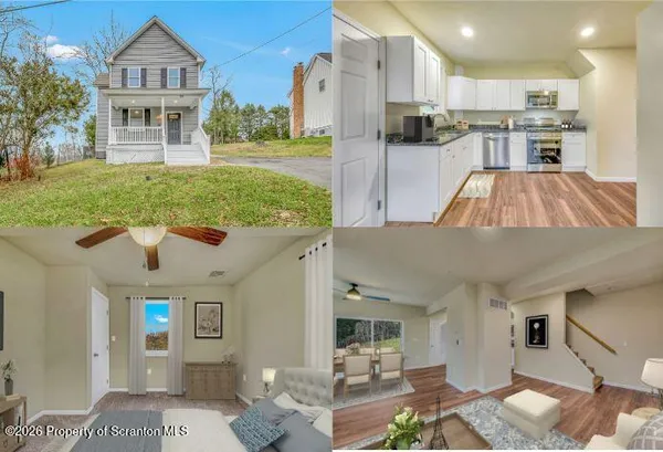 a view of a kitchen with kitchen island stainless steel appliances refrigerator stove a dining table and chairs with the view of garden