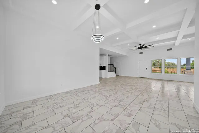 a view of a livingroom with a staircase