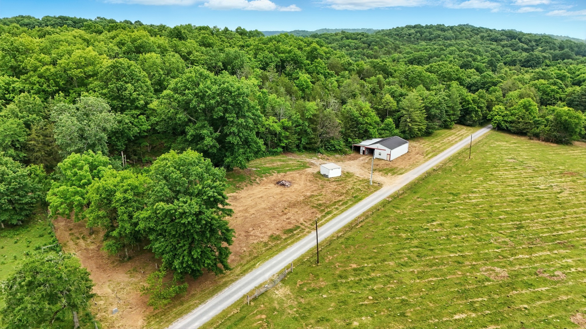 124 Blue Smith Road Petersburg, TN 37144 - Photo 20 of 49 a view of a yard with an outdoor seating