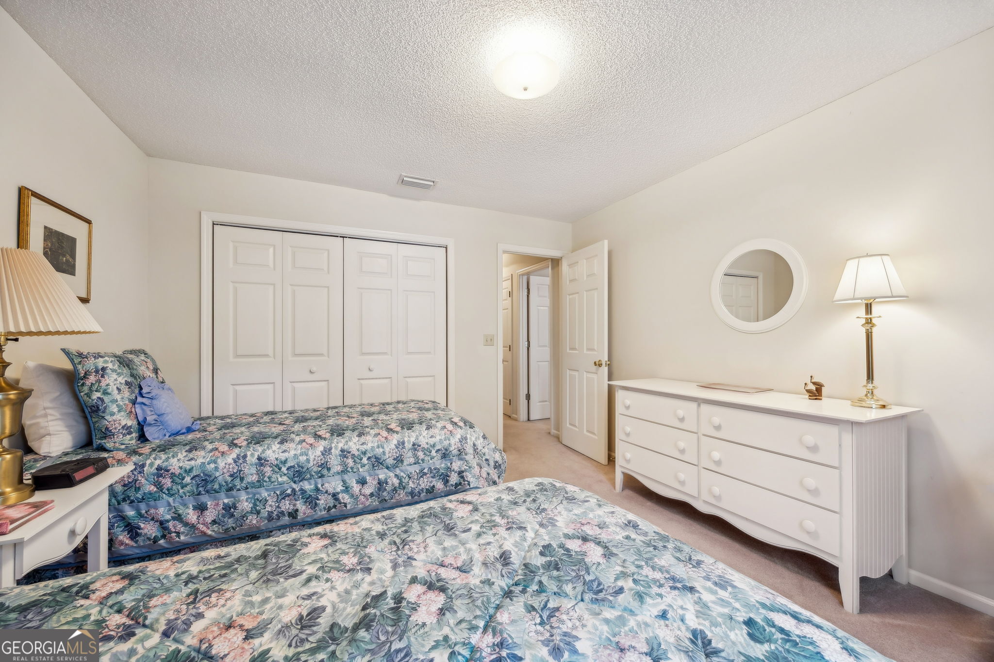 223 Cardinal Circle West St. Marys, GA 31558 - Photo 26 of 54 a bedroom with a bed and a dresser