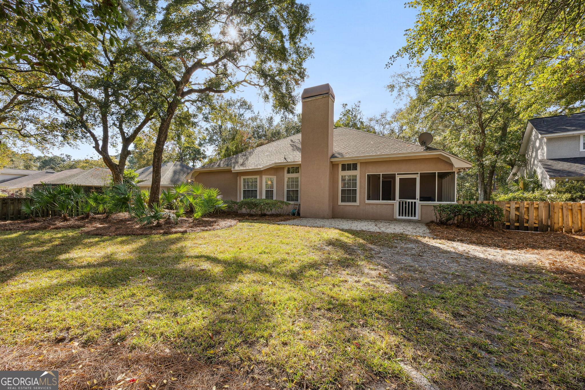 223 Cardinal Circle West St. Marys, GA 31558 - Photo 30 of 54 a front view of a house with a yard
