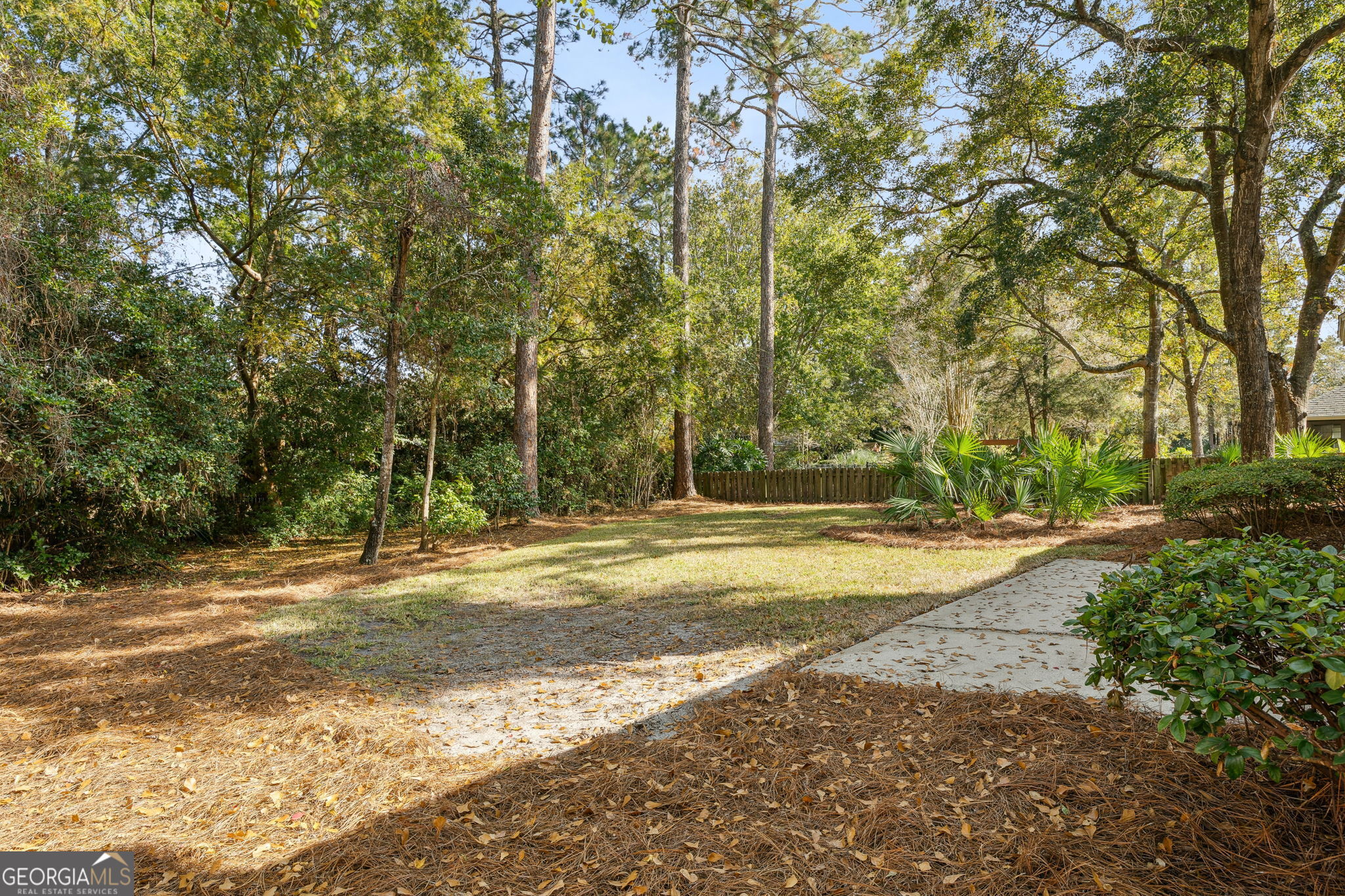 223 Cardinal Circle West St. Marys, GA 31558 - Photo 32 of 54 a view of a house with a yard and basketball court