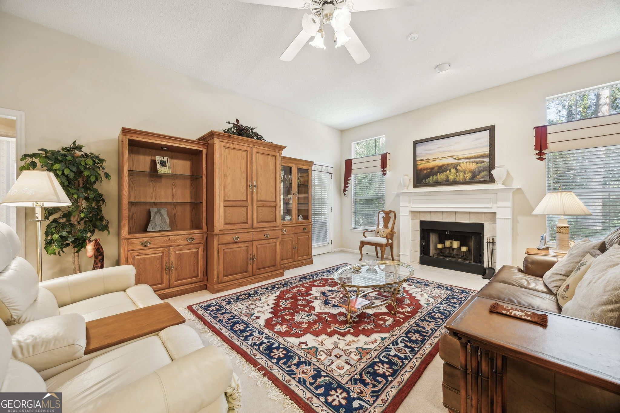 223 Cardinal Circle West St. Marys, GA 31558 - Photo 5 of 54 a living room with furniture and a fireplace