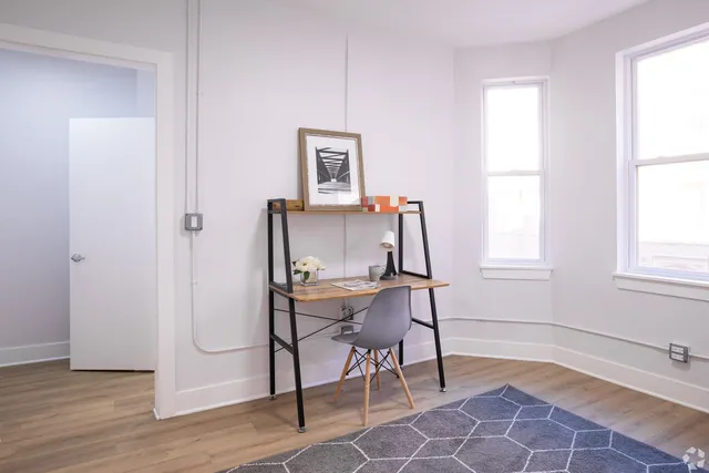 a room with furniture and a window