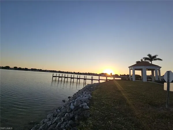 a view of a lake with a outdoor space