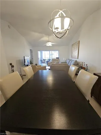 a view of living room and dining room