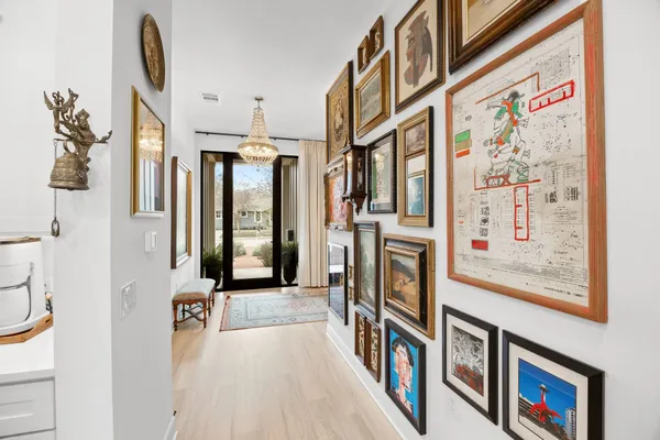 a view of a entryway with furniture and floor to ceiling window