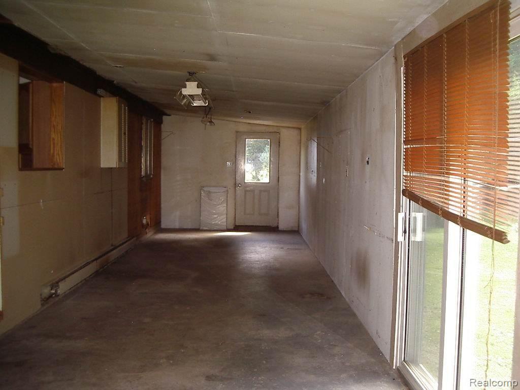 15870 Allen Road Taylor, MI 48180 - Photo 11 of 13 rear porch area