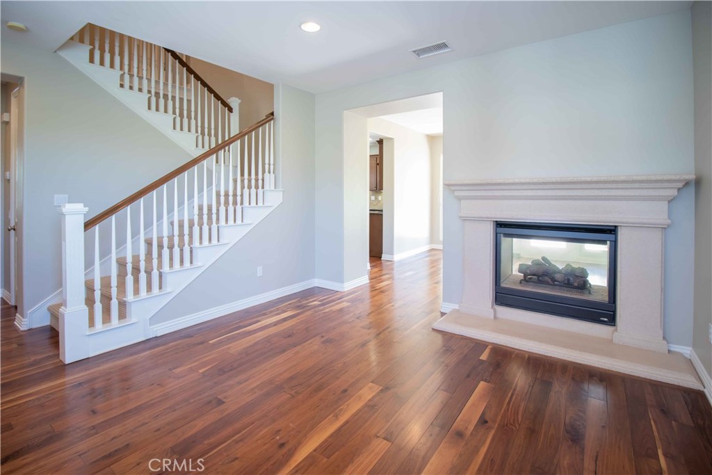 4684 Luna Court Calabasas, CA 91302 - Photo 17 of 48 a view of an empty room with wooden floor and a window