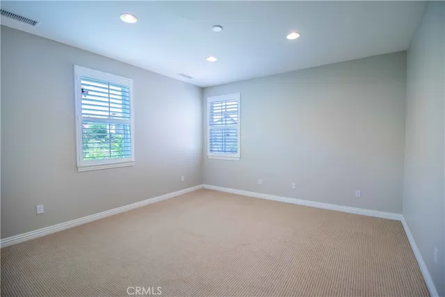 a bathroom with a toilet and a bathtub
